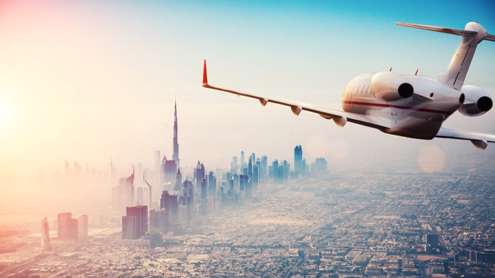 Airplane flying over dubai